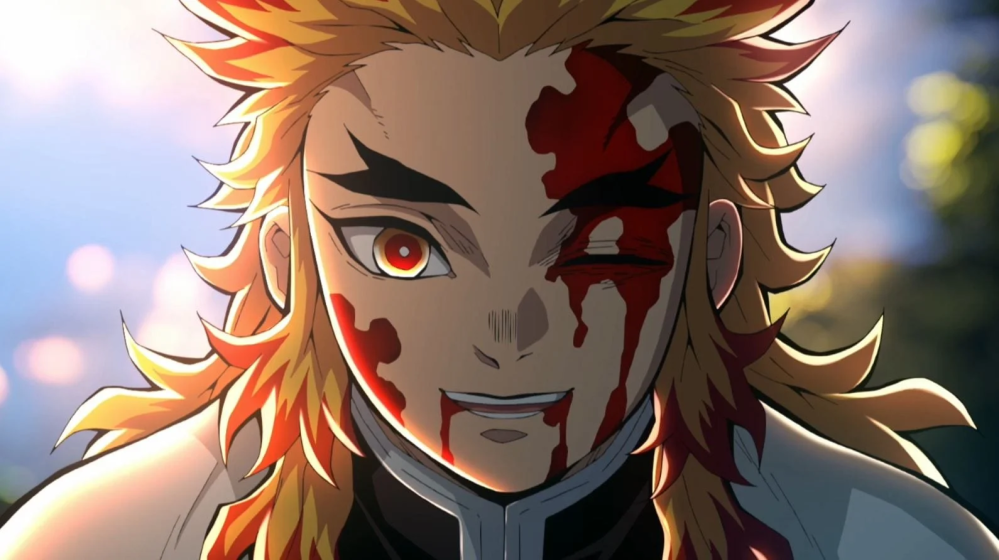 Screengrab of an asian man looking straight at the camera. He has bright yellow hair tipped in orange and he is bleeding fro his mouth as well as from a wound over his left eye. His left eye is closed shut but his right eye is open - the pupils are yellow and red. He's smiling warmly, despite hsi wounds.