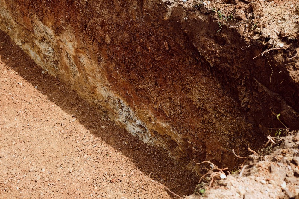 Close-up shot of a ground section of excavated earth