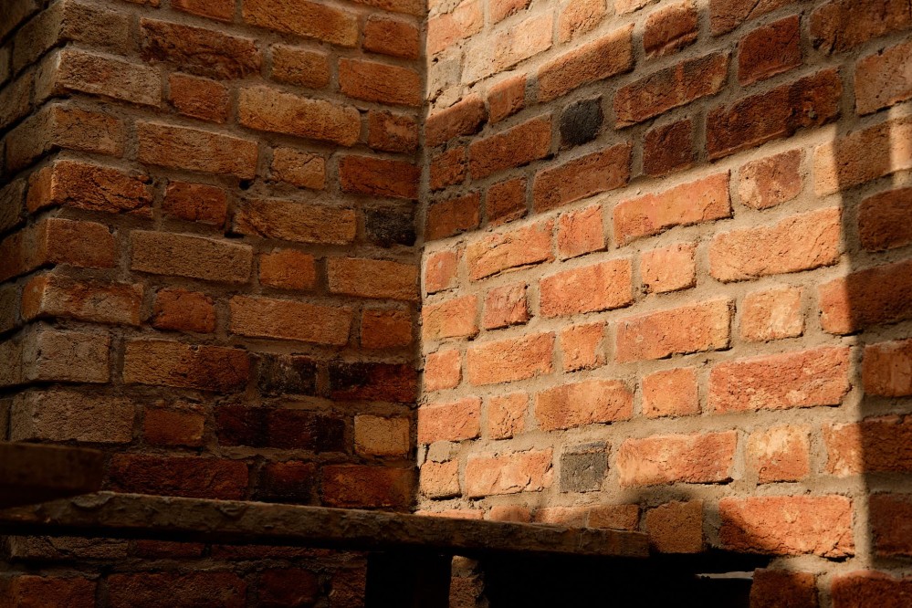 Close-up of an orange brick wall in evening light