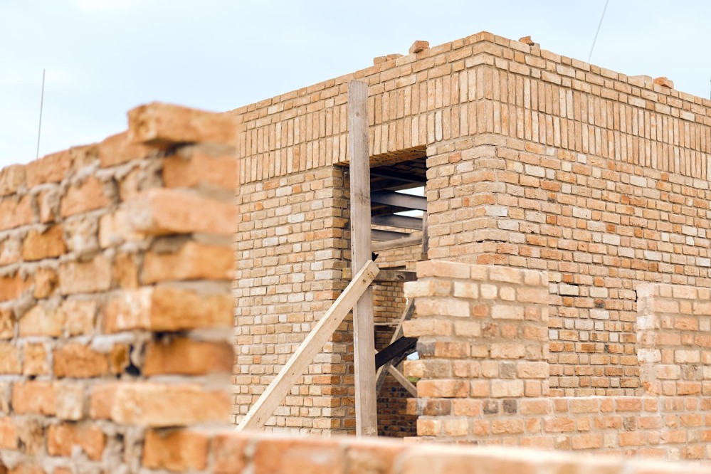 Doorway of half-finished brick building